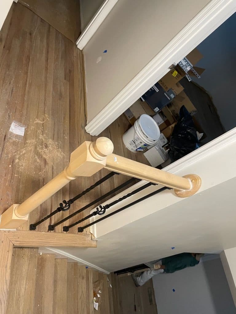 Installing a Chic Staircase with Wood and Metal in Your Home