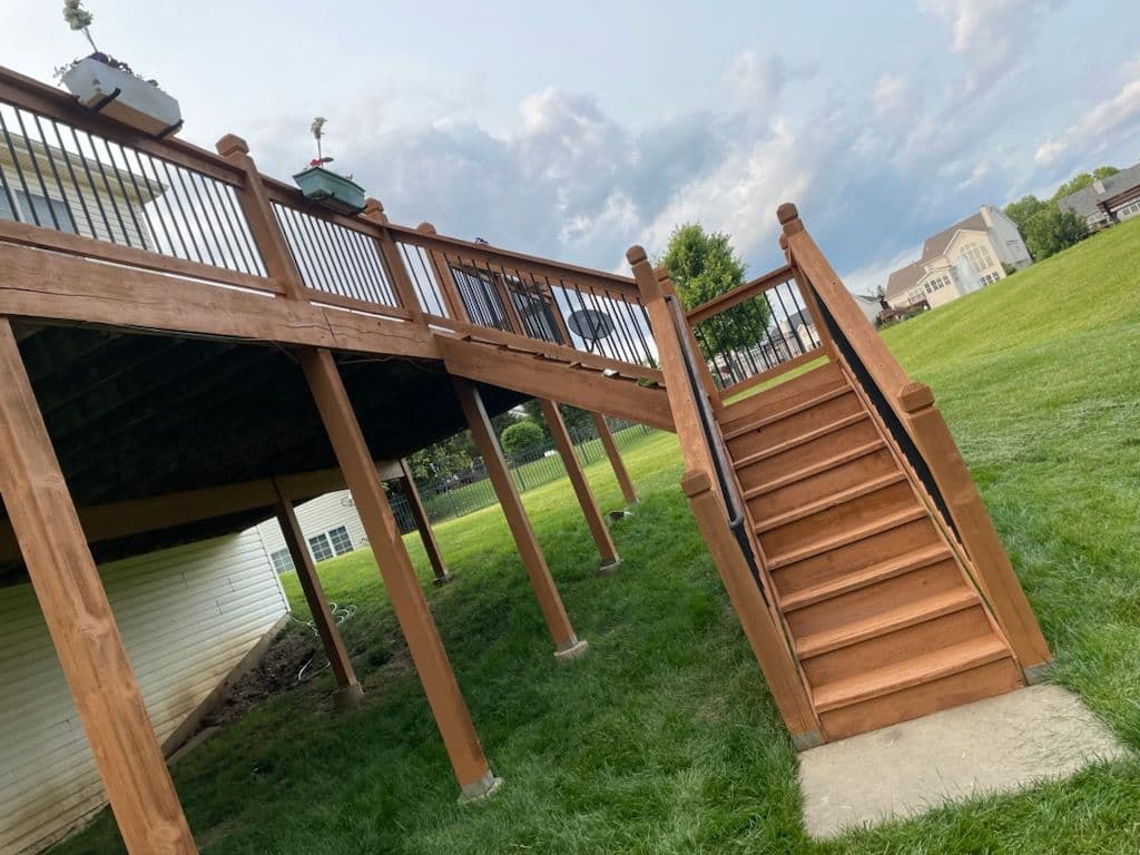Project Stunning Deck Revival in Suburban Backyard image